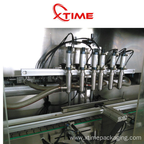 Automatic liquid filling and capping machine